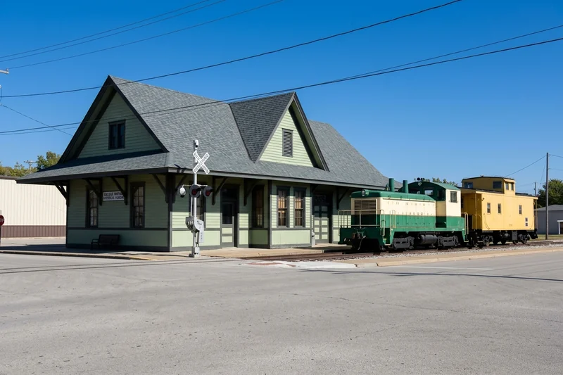 Galena Mining and Historical Museum depot with a locomotive and yellow caboose in Galena, Kansas